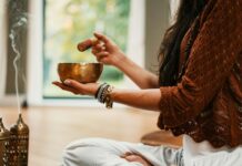 만성 피로 극복! 자신을 위한 치유의 길 woman in brown knit sweater holding brown ceramic cup