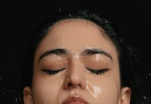 무더위 속 피부 건강, 여름철 필수 관리법 알아보기 a woman with her eyes closed covered in water