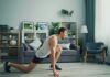 홈 트레이닝, 집에서 건강 지키는 새로운 일상으로 자리잡다 a man is doing push ups in a living room